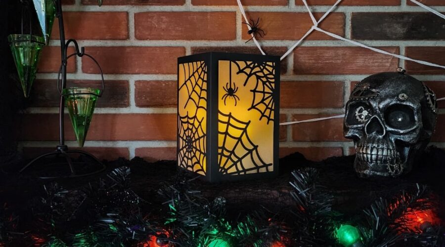 glowing spider web spooky paper lantern on mantle www.emjaybeedesign.com