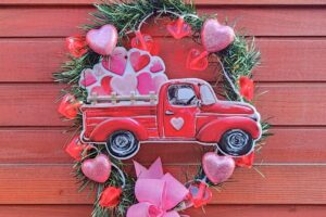 Valentine's day heart wreath diy with foam hearts metal truck bow and lights www.emjaybeedesign.com